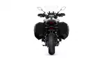 Rear view of a sport-touring motorcycle with large black side cases and a tall windscreen