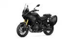 Black Yamaha Tracer GT sport-touring motorcycle with dual side cases and a tall windscreen, angled to show front and left side.