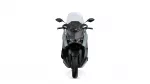 Front view of a modern gray and black sport motorcycle with a clear windshield and angular headlights