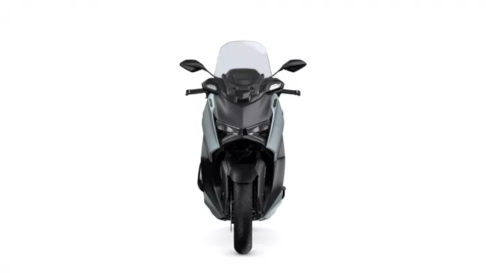 Front view of a modern gray and black sport motorcycle with a clear windshield and angular headlights