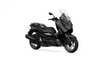 Dark brown Yamaha sport scooter viewed from front-left with a large clear windshield.