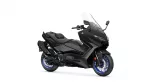 Black Yamaha sport motorcycle shown from the front-right side with a tall clear windshield and blue-accent wheels to emphasize its aggressive styling.