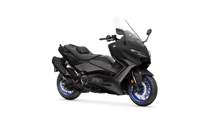 Black Yamaha sport motorcycle shown from the front-right side with a tall clear windshield and blue-accent wheels to emphasize its aggressive styling.