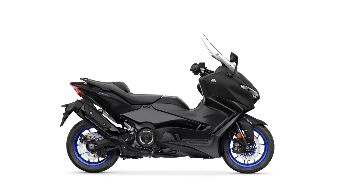 Black Yamaha TMAX scooter in a side view, showcasing its sleek body and blue-rimmed wheels