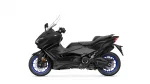 Side view of a black Yamaha TMAX sport motorcycle with a tall windshield and blue rims on a white background] ,