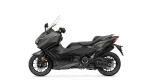Side view of a gray Yamaha sport motorcycle with windshield and black accents.