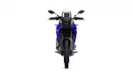 Front view of a blue and black adventure motorcycle with a tall windshield and wide handlebars.