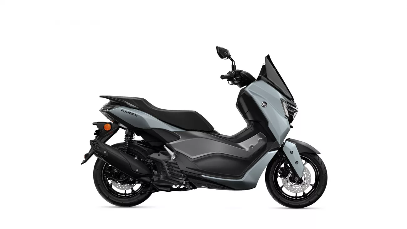 Side view of a gray Yamaha NMAX scooter, showing its front fairing, windscreen, and seat.