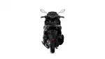 Rear view of a black sport motorcycle on a white background, showing the taillight, seat, and chunky rear tire unmanned by riders far behind.