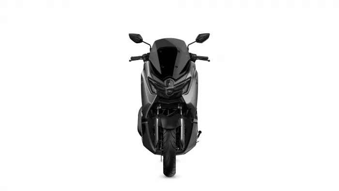 Front-facing view of a gray and black sport motorcycle with a dark windshield and dual headlights behind the fairing.