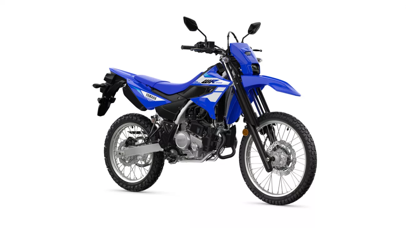Blue Yamaha dirt bike shown in profile with knobby tires and front suspension visible, image focused on off-road motorcycle styling