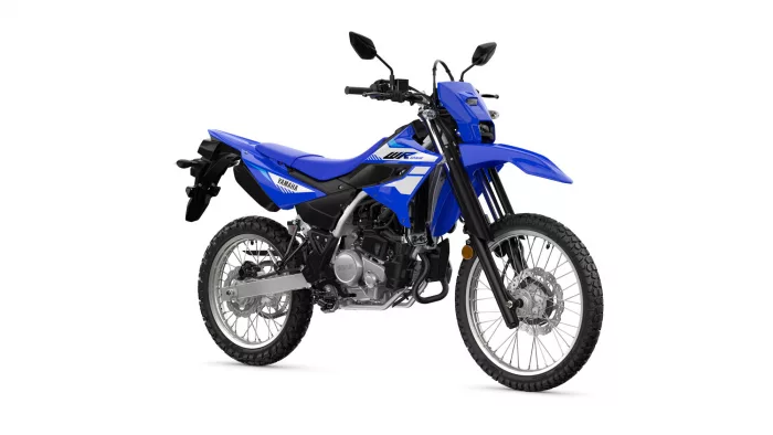 Blue Yamaha dirt bike shown in profile with knobby tires and front suspension visible, image focused on off-road motorcycle styling