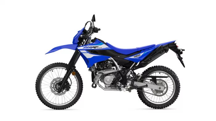 Blue Yamaha dirt bike shown in side view with knobby tires and disc brakes on front wheel.