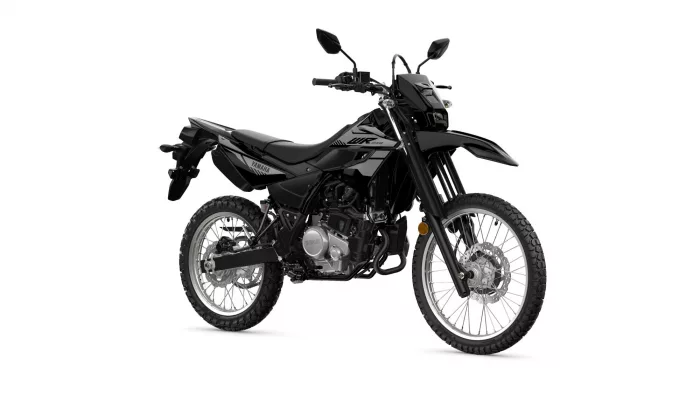 Black Yamaha dual-sport motorcycle with knobby tires, front disc, and slim body, shown from a side angle on a white background.