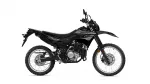Side view of a black Yamaha dirt bike with knobby tires and raised front fender