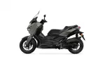 Side view of a gray Yamaha XMAX scooter with windshield and dual front discs