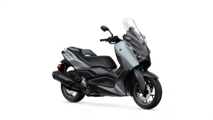 Yamaha X-MMAX scooter with windshield, shown in side-front view on a white background