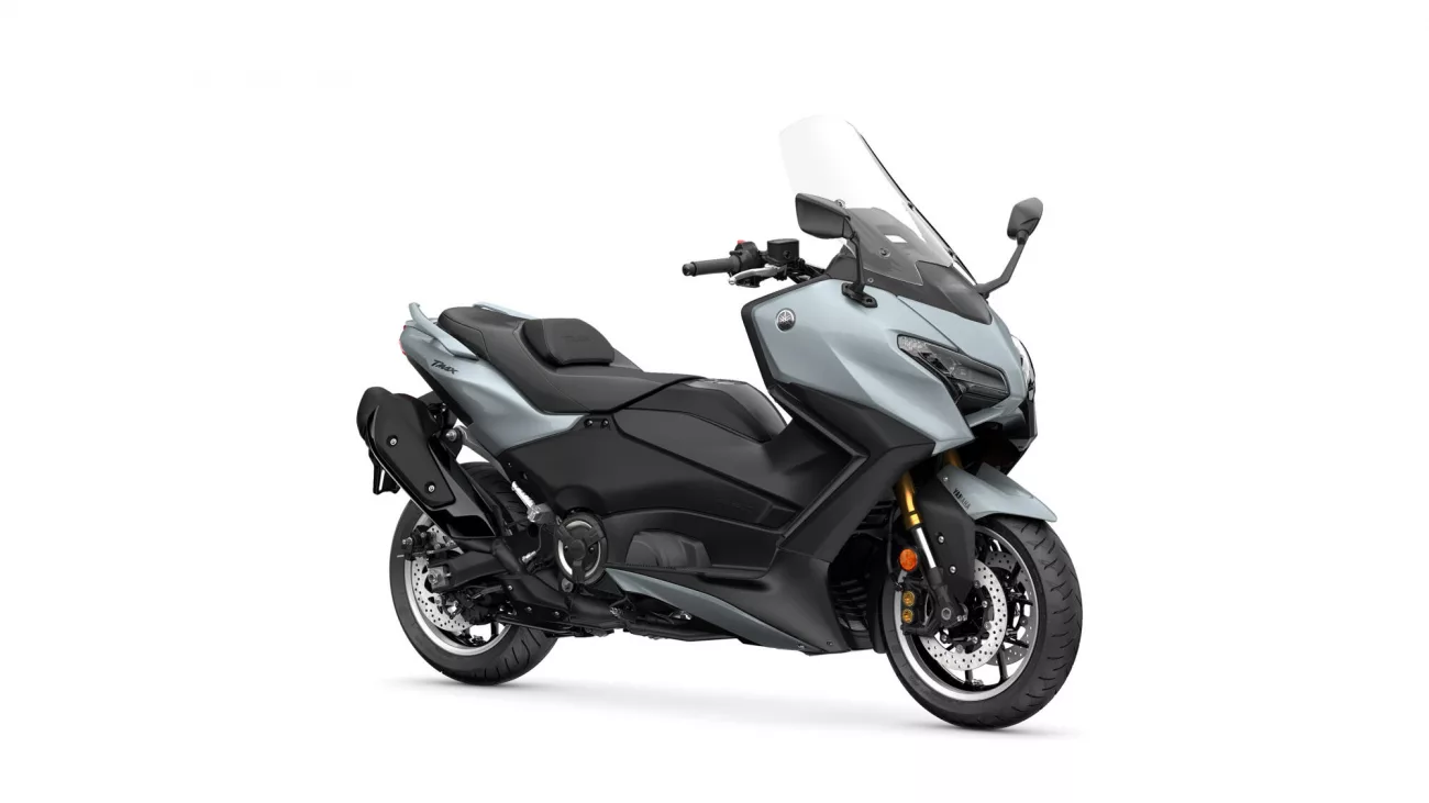 Front-right side view of a gray Yamaha sport-t touring motorcycle with a tall windshield and dual disc brakes along the front wheel