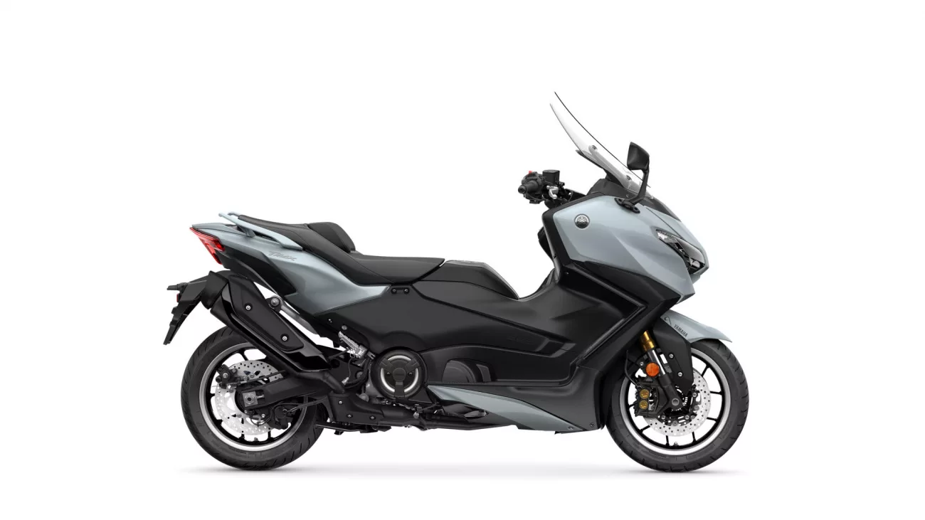 Side profile of a gray and black Yamaha sport touring motorcycle with a large windshield.