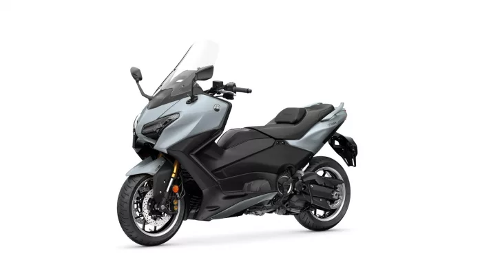Yamaha TMAX sport scooter shown from front-right, gray body with large windshield and black trim.