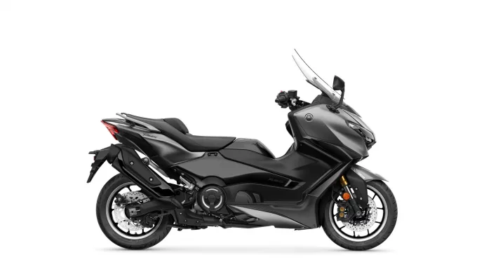 Black sport scooter shown in side profile, highlighting the sleek body and large front windshield edge.