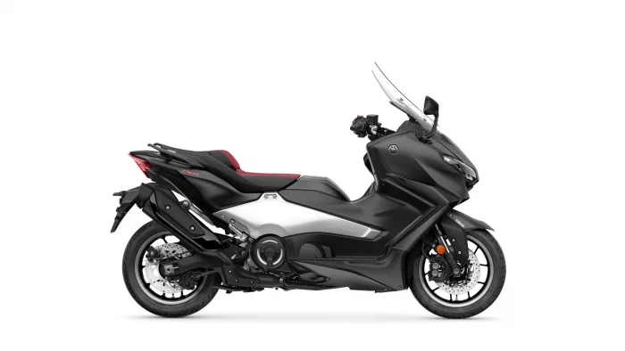 Black Yamaha sport motorcycle shown in a side profile with a red-accented seat and tall windscreen on a white background.