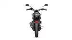 Front view of a black Yamaha motorcycle with a circular headlight and wide front tire viewed head-on.