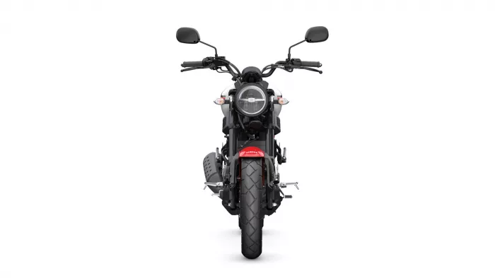 Front view of a black Yamaha motorcycle with a circular headlight and wide front tire viewed head-on.