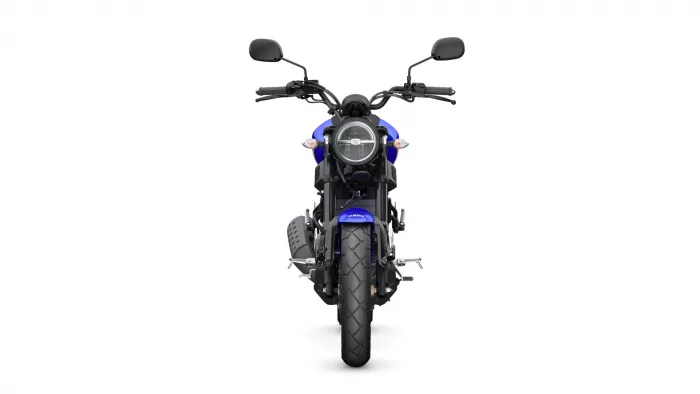 Front view of a blue Yamaha motorcycle facing the camera, round headlight and side mirrors visible.