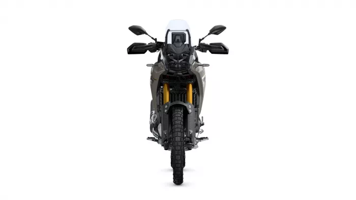 Front view of a black-and-gray adventure motorcycle with a tall windscreen, gold front forks, and knobby tires