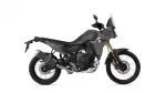Left-side profile of a Yamaha Tenere 700 adventure motorcycle with a tall windscreen and rugged dual-sport tires.