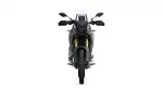 Front view of a rugged adventure motorcycle with a tall windshield and dual headlights.