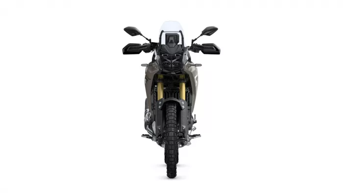 Front view of a rugged adventure motorcycle with a tall windshield and dual headlights.