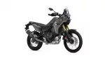 Side view of a Yamaha Tenere 700 adventure motorcycle in olive green with gold front forks and off-road tires
