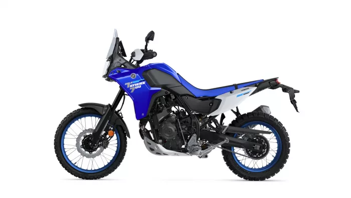 Blue Yamaha Tenere 700 adventure motorcycle shown from the left side against a white background.
