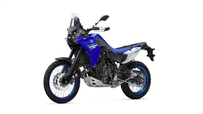 Blue Yamaha Tenere 700 adventure motorcycle shown from the left side, highlighting blue body panels and front wheel.