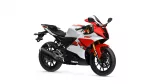 Red and white Yamaha sport motorcycle shown at a three-quarter front angle, emphasizing its sleek fairing and aggressive stance