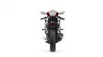 Rear view of a sport motorcycle facing the camera, showing red seat, white/black body, and visible exhaust on the right side
