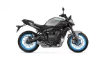 Side view of a Yamaha MT-07 street motorcycle with gray body and bright blue rims against a white background