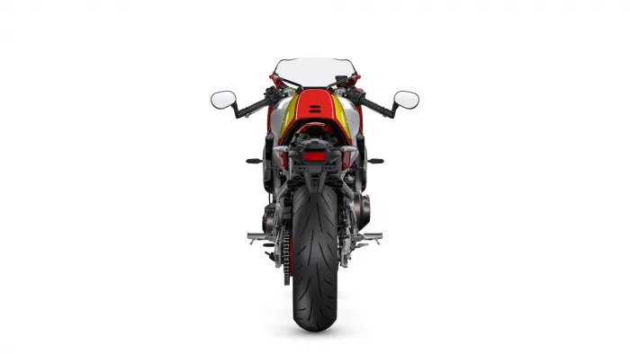 Rear view of a red and yellow sport motorcycle on a white background, centered.