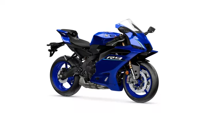 Blue Yamaha sport motorcycle shown from a side-front angle, with 'R9' decal on the fairing against a white background.