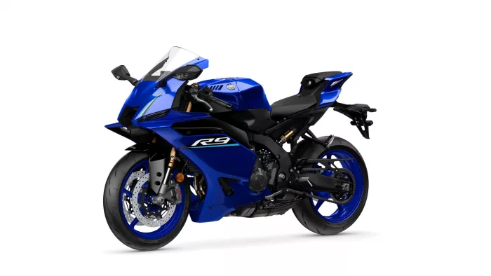 Blue Yamaha R6 sport motorcycle shown from a left-side angle, featuring blue fairings, windshield, and blue rims