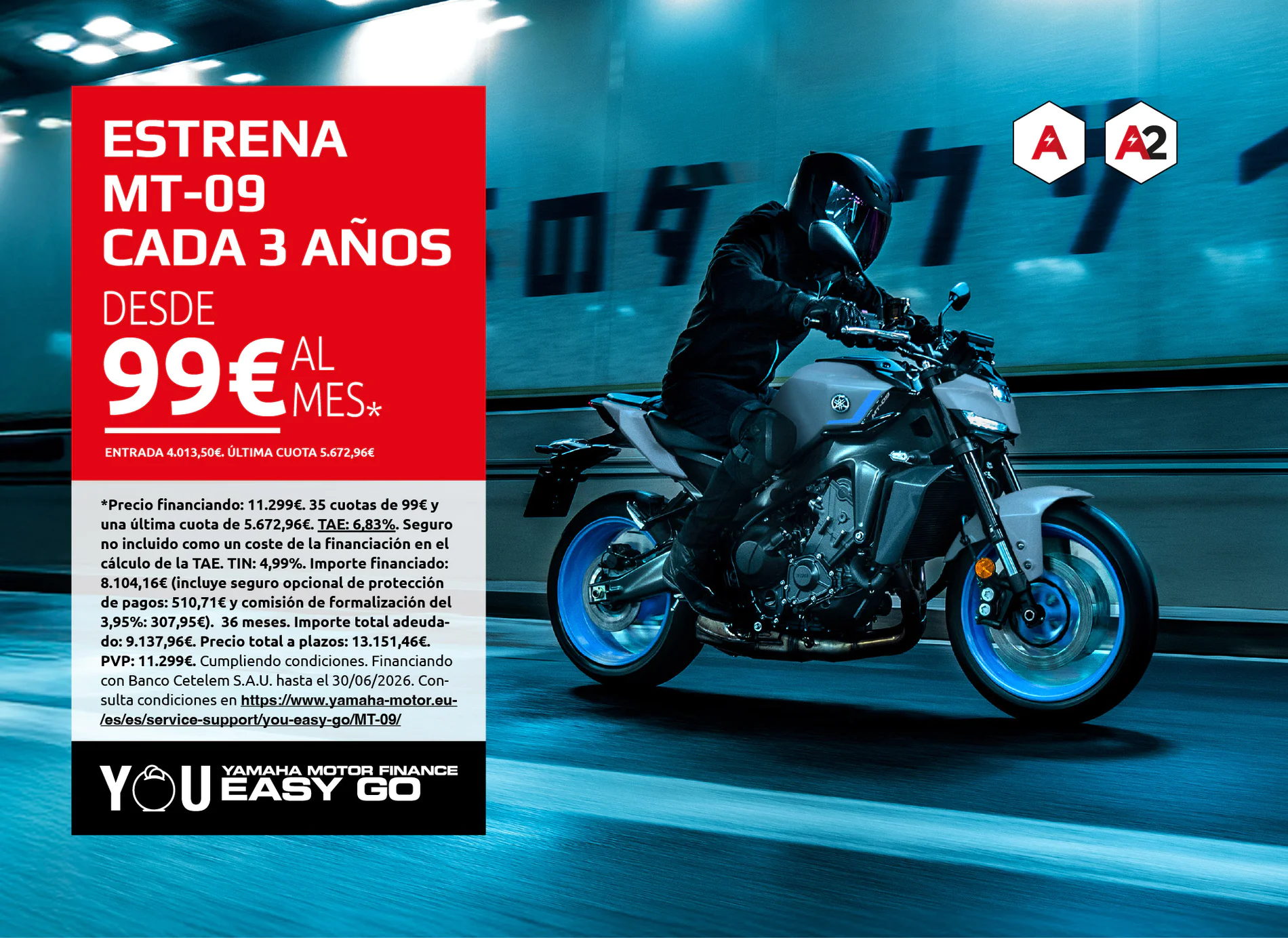 Motorcyclist on a Yamaha MT-09 rides through a blue tunnel beside a large red promotional panel that says 'ESTRENA MT-09 CADA 3 AÑOS DESDE 99€ AL MES'