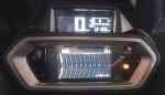 Car instrument cluster showing speed 0 km/h, odometer 12,180 km, with a warning light on the right side.